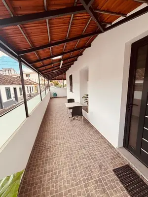 an empty corridor of a building with a wooden ceiling at Vila Ramos I in Funchal