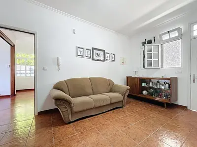 a living room with a couch and a table at Villa Santa Luzia 2 by Atlantic Holiday in Santa Luzia
