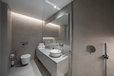 a bathroom with a sink and a toilet at Calheta Hills II by An Island Apart in Estreito da Calheta