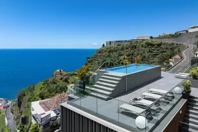 a house with a view of the ocean at Calheta Hills II by An Island Apart in Estreito da Calheta