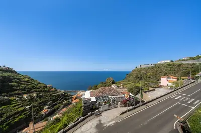 a view of a road next to the ocean at Calheta Hills II by An Island Apart in Estreito da Calheta