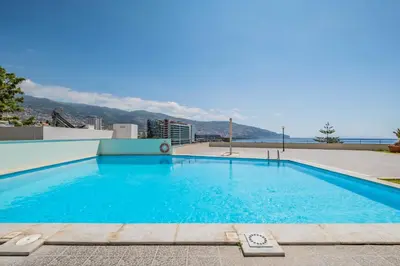 a swimming pool on the roof of a building at Infinity View by Homie in Funchal