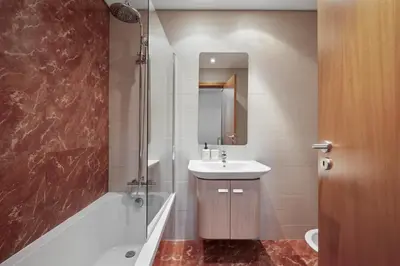 a bathroom with a sink and a shower and a toilet at Urban Stay 3A by Homie in Funchal