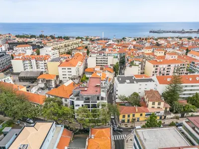 an aerial view of a city with orange roofs at Urban Stay 3A by Homie in Funchal