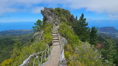 a path on the great wall of china on a mountain at Casa da Cascata in Santana