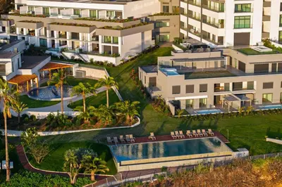 an aerial view of a resort with a swimming pool at Acqua Residence VI by An Island Apart in Funchal