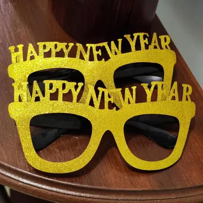 a pair of glasses with a happy new year sign at Sol II in Funchal
