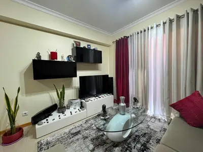 a bedroom with a bed and a closet at Funchal Cozy Private Room, Ensuite Bathroom, WiFi and Great Location in Funchal