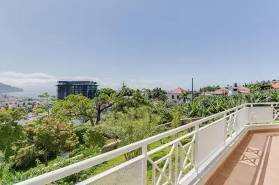 a balcony with a view of the city at Sao Joao- 3 Bedroom apartment in Funchal