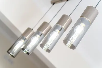 a group of lights hanging from a ceiling at GuestReady - Typical experience in Funchal in Funchal