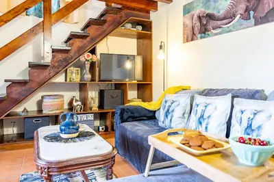 a bedroom with a bunk bed with a pillow and a lamp at Sounds of Nature in Santana