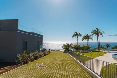 a view of the beach from a house at GuestReady - Soothing escape in Funchal in Funchal