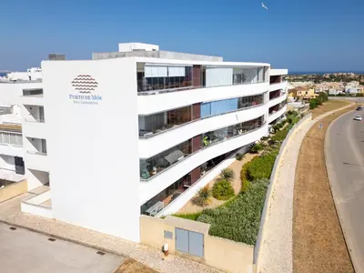 an apartment building with a vertical garden on the facade at Beach Condominium 27 by Destination Algarve in Santo Amaro
