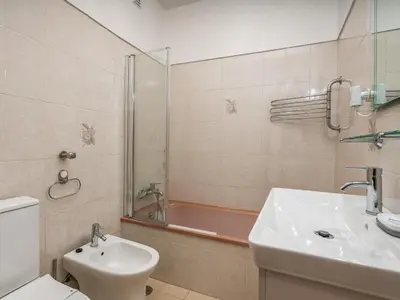 a bathroom with a toilet and a sink and a shower at Traditional house by the beach #1979 in Luz