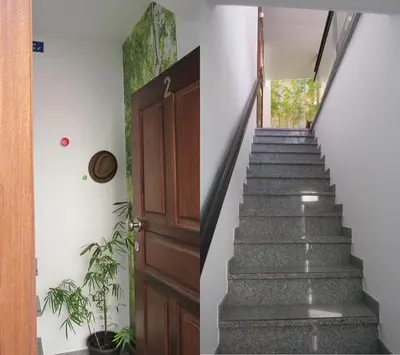 a stairway leading up to a room with a door at João & Amália apartment by Rentallido in Funchal