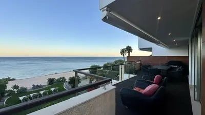 a balcony with chairs and a view of the ocean at Luz by Check-in Portugal in Luz
