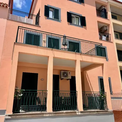 an apartment building with a balcony and a speaker at Carmo Heritage Terrace in Funchal