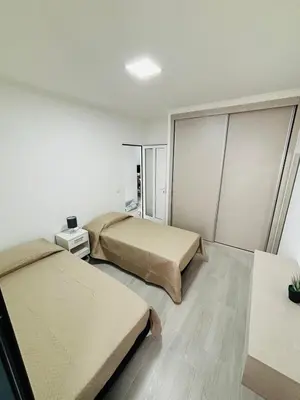 a room with two beds in a room at Vila Ramos II-Funchal in Funchal