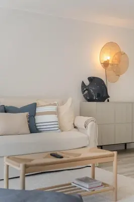 a living room with a couch and a coffee table at Promenade II by An Island Apart in Funchal