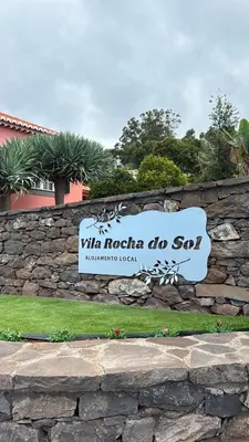 a sign for the villas da sap sign on a stone wall at Vila Rocha Do Sol 59B - Ensuite Room With Balcony View in Canhas