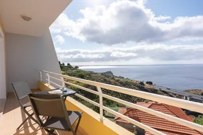 a balcony with a view of the ocean at Atlantic View I By GALMI in Santa Cruz