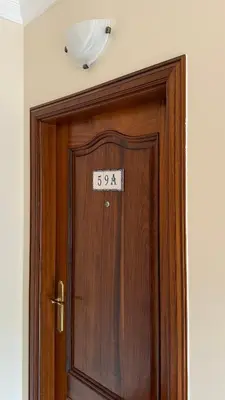 a wooden door with a sign on top of it at Vila Rocha Do Sol 59A - Ensuite Room With Balcony View in Canhas