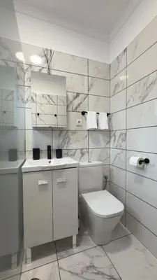 a white bathroom with a toilet and a sink at Vila Rocha Do Sol 59A - Ensuite Room With Balcony View in Canhas