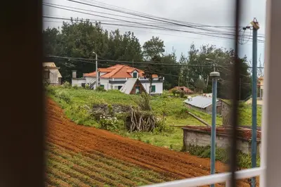 a view of a farm from a window at GuestReady – Charming Getaway by Madeira's Nature in Santana
