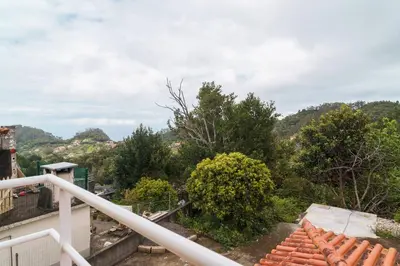 a view from the balcony of a house at GuestReady – Charming Getaway by Madeira's Nature in Santana