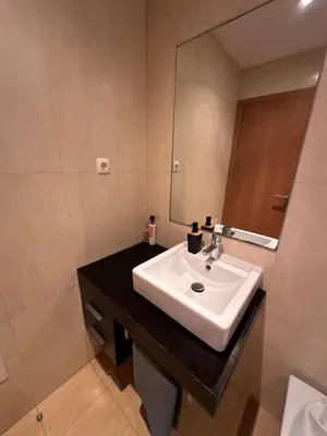 a bathroom with a sink and a mirror at Heart of Madeira in Funchal