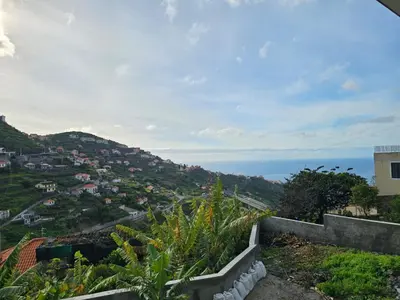 a view of the ocean from a hill at Villa Rodrigues 2 by Rentallido in Campanário