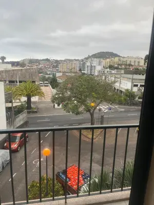 a balcony with a view of a city street at Relax accommodation in Funchal