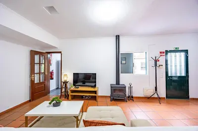 a living room with a couch and a table at Pena Vista Mar Funchal by YOUR KEY in Funchal
