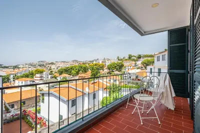 a balcony with a view of a city at Casa Nóbrega, By OP in Funchal