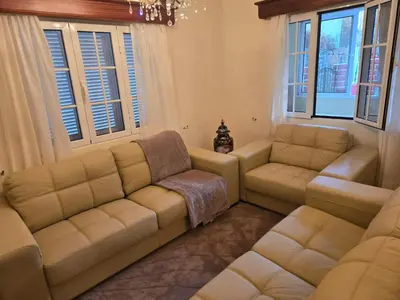 a living room with a couch and two couches at Villa Pedro, Big House in Calheta