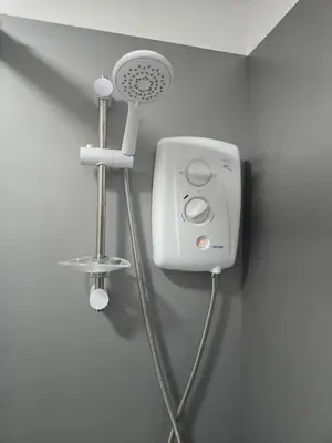 a hair dryer is attached to a wall at Zen Space in Funchal