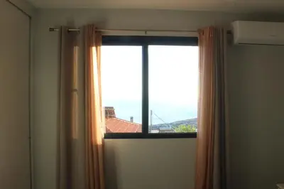 a window in a room with a view at Nature Apartment 2 with Pool in Arco da Calheta