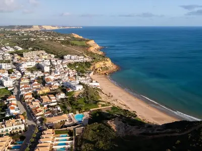 an aerial view of a beach and the ocean at Lovely beach apartment, sea views, rooftop terrace #1974 in Budens