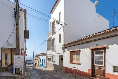 an alley in a small town with buildings at Lovely beach apartment, sea views, rooftop terrace #1974 in Budens