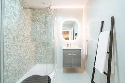 a bathroom with a shower and a sink at Nora Charming Apartment - Pool -10m Walk City Center in Funchal
