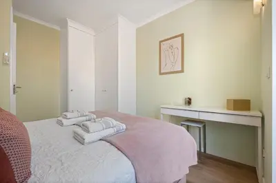 a bedroom with a bed with towels on it at Achada by Homie in Funchal