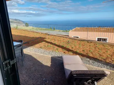 a view of the ocean from a balcony at Casa Caipirinha in Prazeres