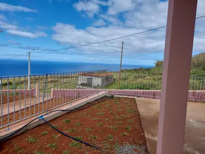 a balcony with a view of the ocean at Casa Caipirinha in Prazeres