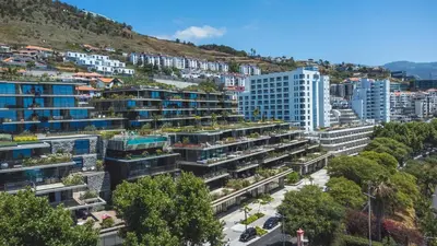 an aerial view of a city with tall buildings at Seaside Escape by Atlantic Holiday in Funchal