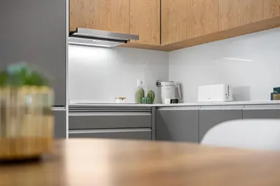 a kitchen with a table and a counter top at MK Apart I in Funchal