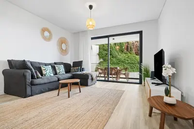 a living room with a couch and a table at MK Apart I in Funchal