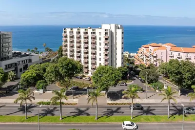 an aerial view of a city with the ocean at Monumental Studio 10 by An Island Apart in Funchal