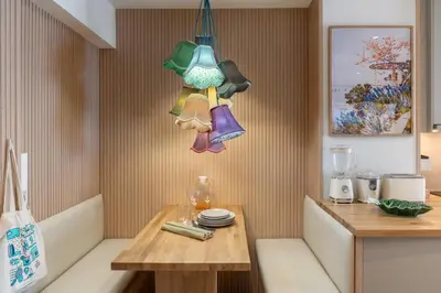 a kitchen with a table and some pots and pans at Monumental Studio 10 by An Island Apart in Funchal