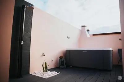 a bathroom with a shower in the corner of a room at Casa da Carreira in Almagreira