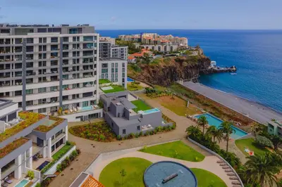 an aerial view of a city and the ocean at FLH Funchal Seaside at Acqua Residences in Funchal